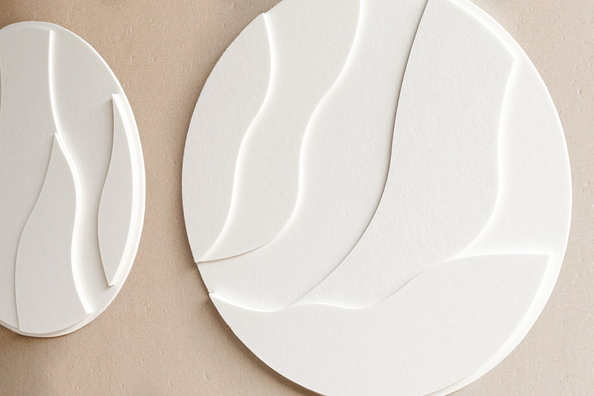 Deux Art en Feutre Circulaire côte à côte, vus de trois-quarts