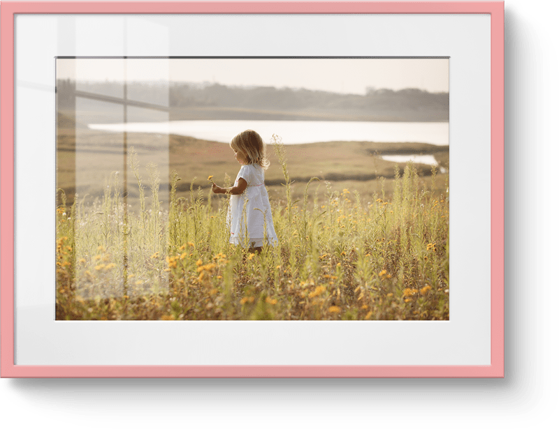 Photo dans cadre rose clair
